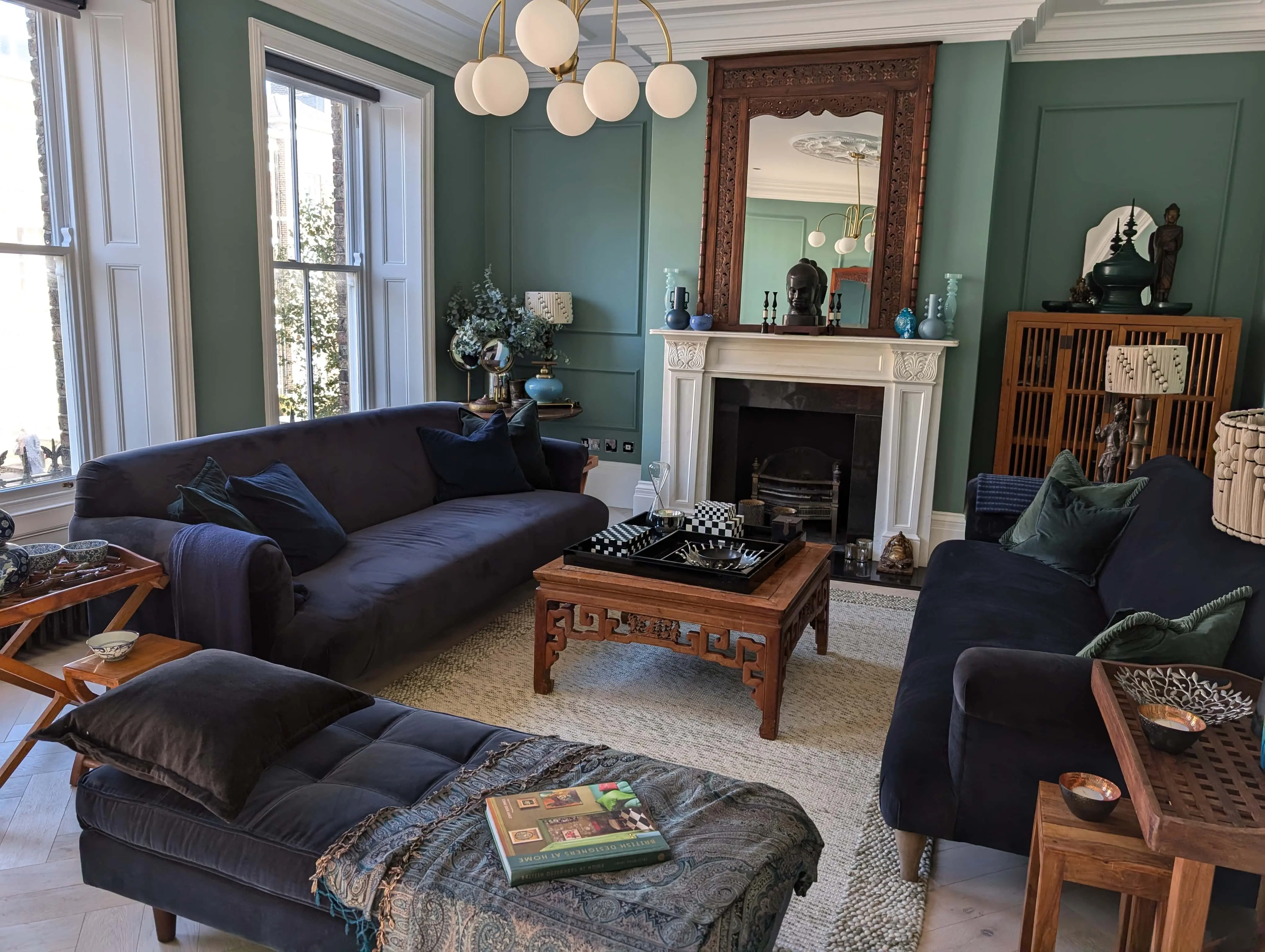 carlton-terrace-period-living-room-heritage-interior-acre-design.webp Period living room with restored fireplace and bespoke joinery in Carlton Terrace townhouse renovation by Acre Design