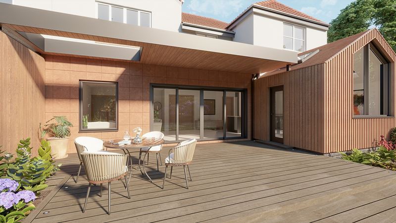 3D visual of a proposed timber-clad rear extension with a garden deck and outdoor dining set